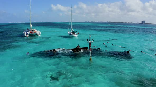 Aerial View of Snorkeling in the Caribbean Sea Near the Sinked Ship