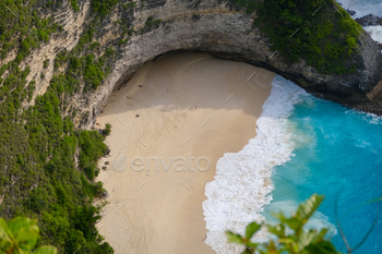 Secluded Beach Below Cliff with Pristine Sand and Turquoise Waters