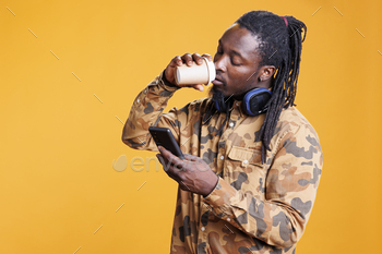 Man holding phone browsing on internet