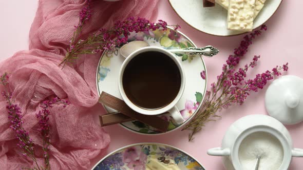 Hot Chocolate or Cocoa in Cup with Various Sweets on Sides. White Chocolate Bar and Biscuits