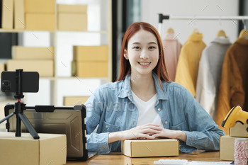 Confident woman portrait entrepreneur at ecommerce fashion or warehouse looking at camera.