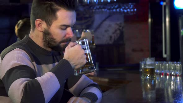 Guy Smells Beer at the Pub