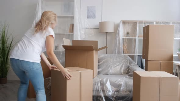 Home Relocation Moving Day Family Carrying Boxes