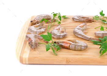 Fresh shrimps on wooden board