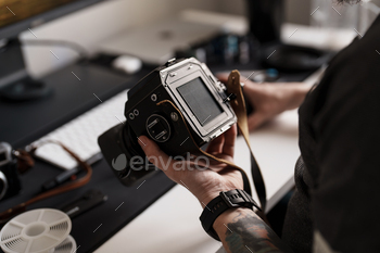 Photographer Tuning Medium Format Camera