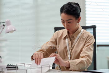 Bank Manager Taking Document