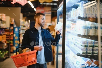 Man shopping in a supermarket