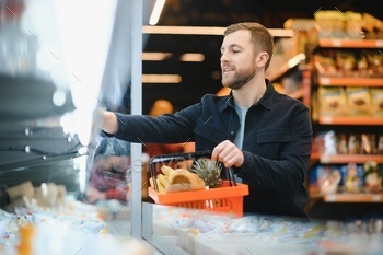 Man shopping in a supermarket