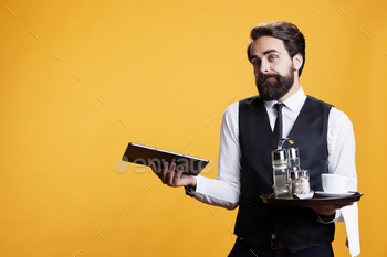 Stylish waiter prepares list of prices