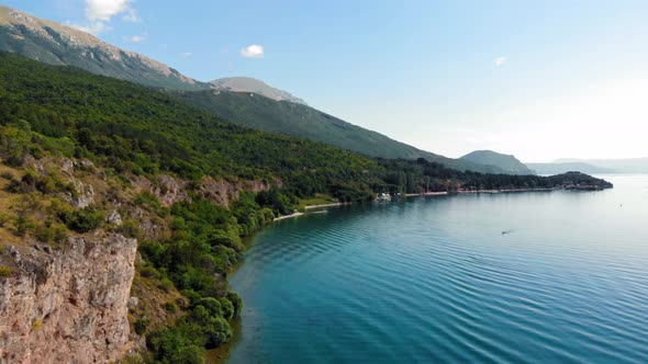 Aerial shot of Macedonia coast. Clif and beautiful water around Ohrid Lake in Southern Europe.