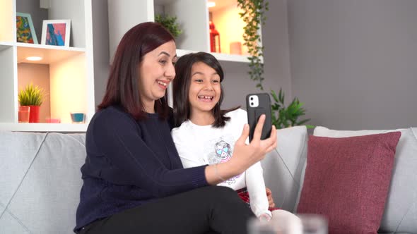 Video call of mother and daughter.