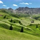 Dolomites Mountains with hiking paths and wooden cottages - VideoHive Item for Sale