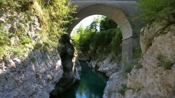 The Soča River in Slovenia, part of the Triglav National Park, has an emerald green color, and is on