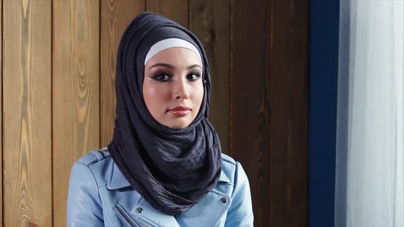 Portrait of Young Muslim Woman in Hijab Indoor