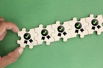 wooden puzzle with certified icons.
