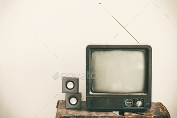Retro old television on table. Vintage retro style.