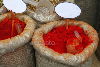 Close up bags of spices with blank price tags