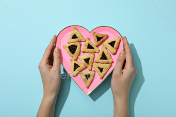 Cookies in a plate for the day of Purim.