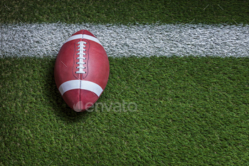 Football at the goal line on a grass field overhead view