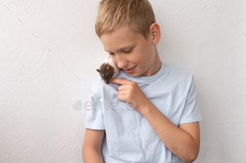 Boy with Pet Rat on Shoulder