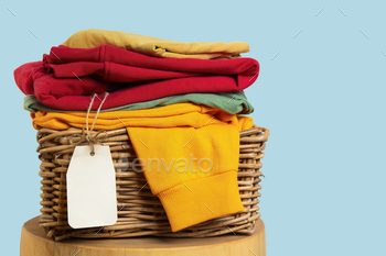 Stack of Folded Clothes for Sale with Price Tag