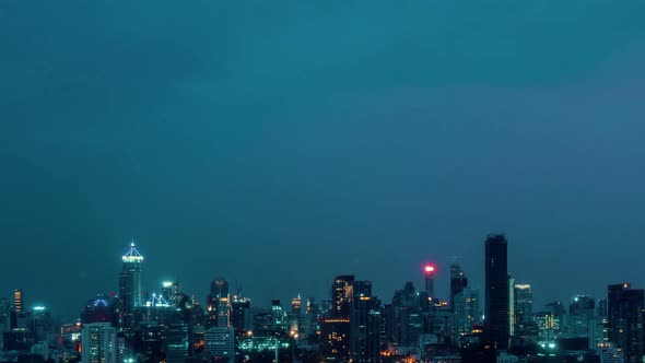 Time Lapse Night Cityscape and Highrise Buildings in Metropolis City Center