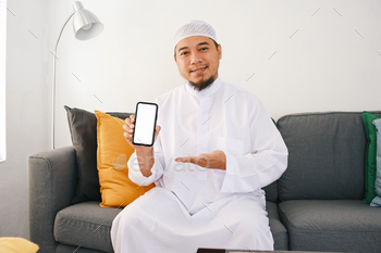 Muslim Man Showing Phone Screen