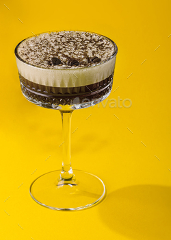 Coffee cocktail with cream and coffee beans