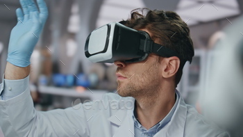 Glasses scientist controlling virtual reality in neuroscience laboratory closeup