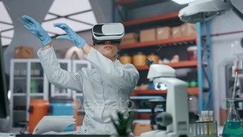 Vr glasses doctor controlling augmented reality simulation in laboratory closeup