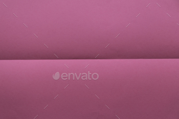 Folded pink color paper for background.