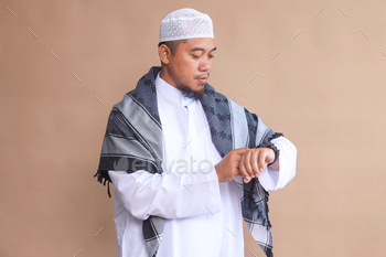 Muslim Man Checking Time