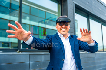 Businessman gesturing wearing augmented reality innovative goggles