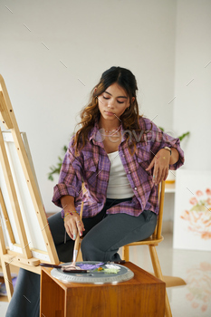 Girl Painting on Canvas