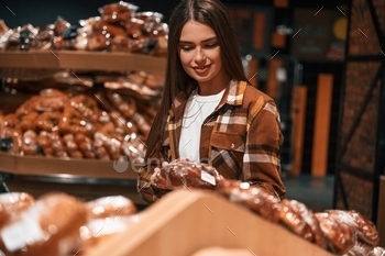 Woman is shopping in the supermarket