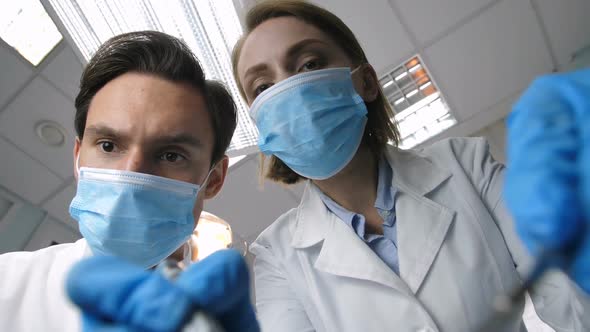 Medical Dental Staff Treating Patient