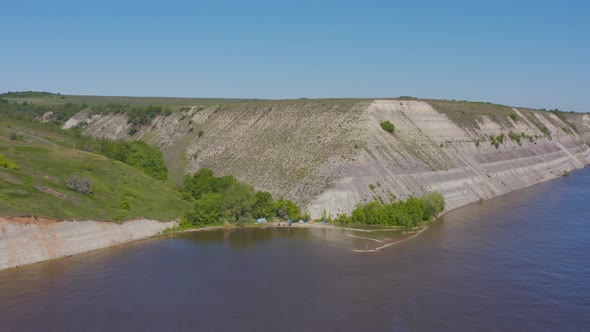 Steep Bank of the River From a Bird's Eye View. Bank of the Volga River in Russia. Aero 