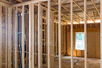 Sticking a framework to wooden framing of new construction home