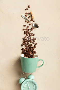 Coffee Beans Streaming Over Alarm Clock
