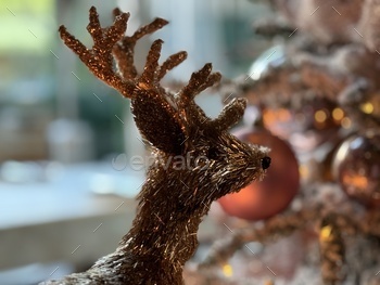 Christmas scene with a glittering reindeer