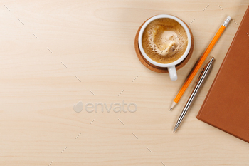 Workplace essentials: Coffee, notepad, supplies