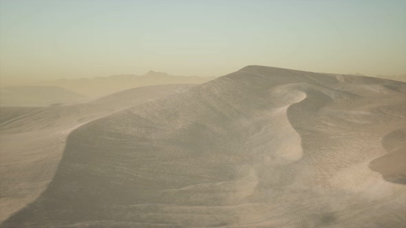 Aerial View on Big Sand Dunes in Sahara Desert at Sunrise alt
