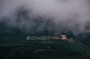 an image of a castle that is high in the mountains