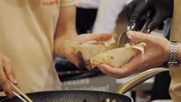 Mexican Tacos Shells with Beef Meat on Street Food Festival Onion Chef Cooking on Grill Traditional