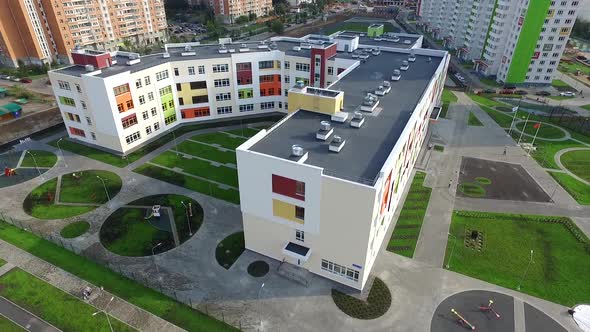 the exterior of the new modern school in the modern residential district,exterior