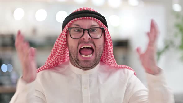 Upset Young Arab Businessman Shouting, Screaming 