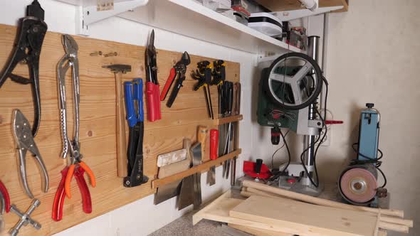 Returning tools to the woodworks workshop