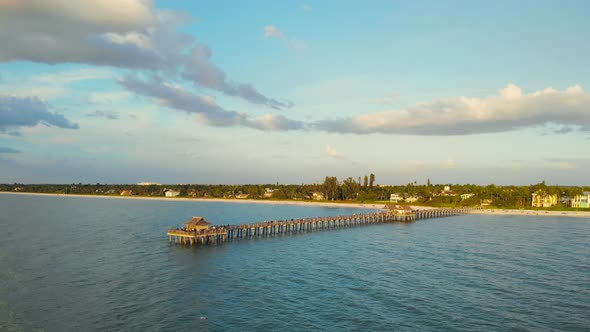 Naples Beach and Fishing Pier at Sunset, Florida.