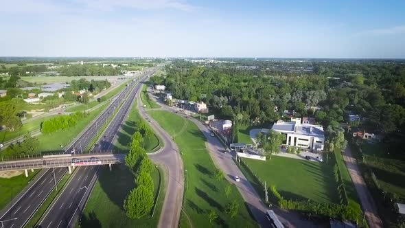 Aerial Drone Scene of City Traffic. Cars and Trucks Movement are Filmed. Aerial Highway