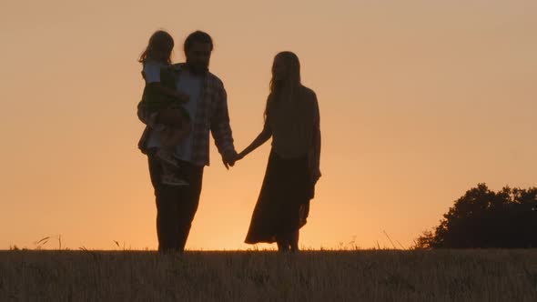 Happy Family with Child Three Silhouettes People Parents with Kid Daughter Jump Walking Jumping in